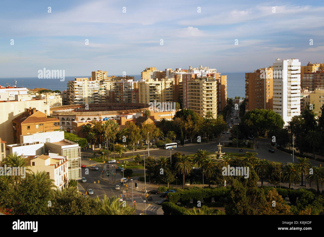 View on bull fighting arena (Plaza de toros de La Malagueta) and port in Malaga, Spain from Castillo de Gibralfaro Stock Photo