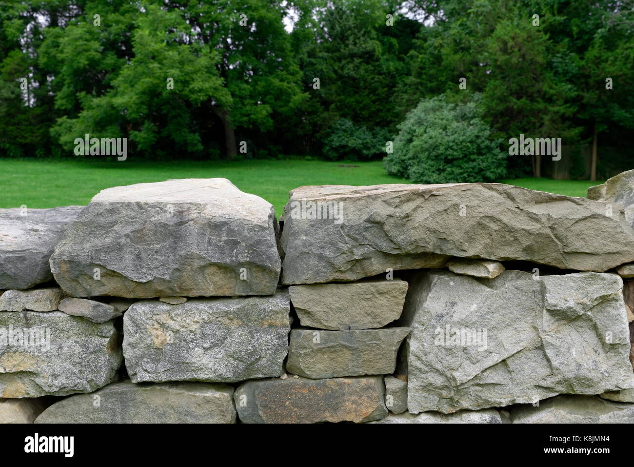 Stone fence alon the sunken road at Fredericksburg National Cemetery, Fredericksburg, Virginia, USA. Stock Photo