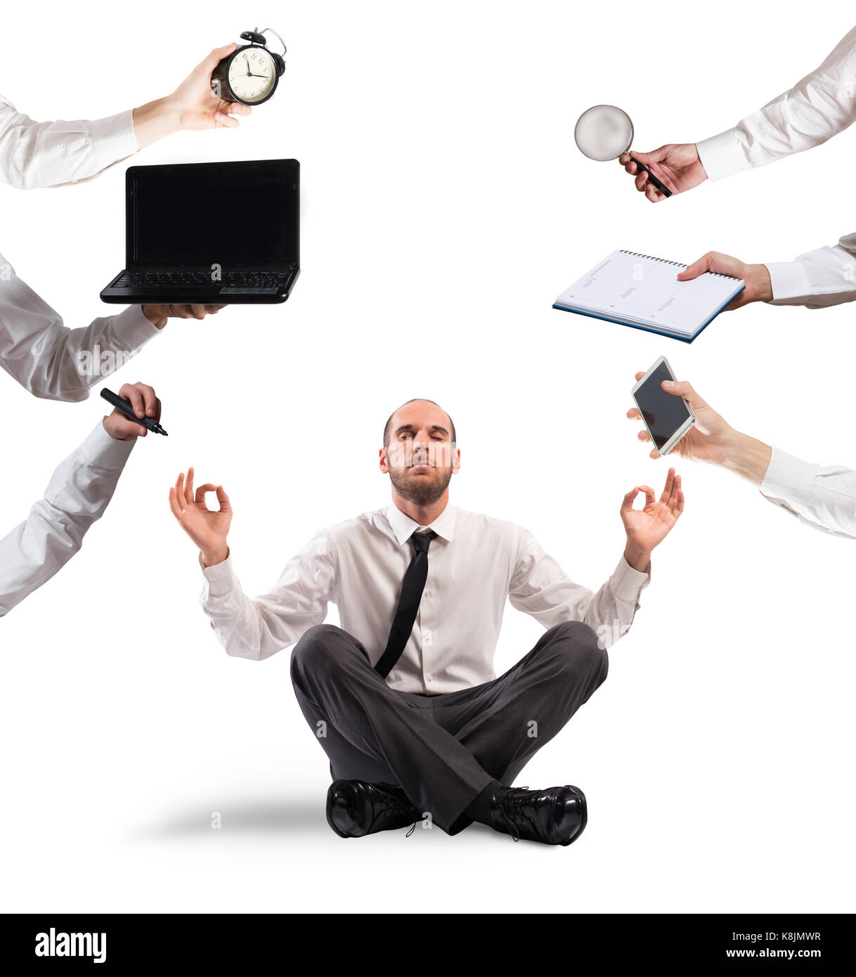 Relaxed businessman that does yoga during the work Stock Photo - Alamy