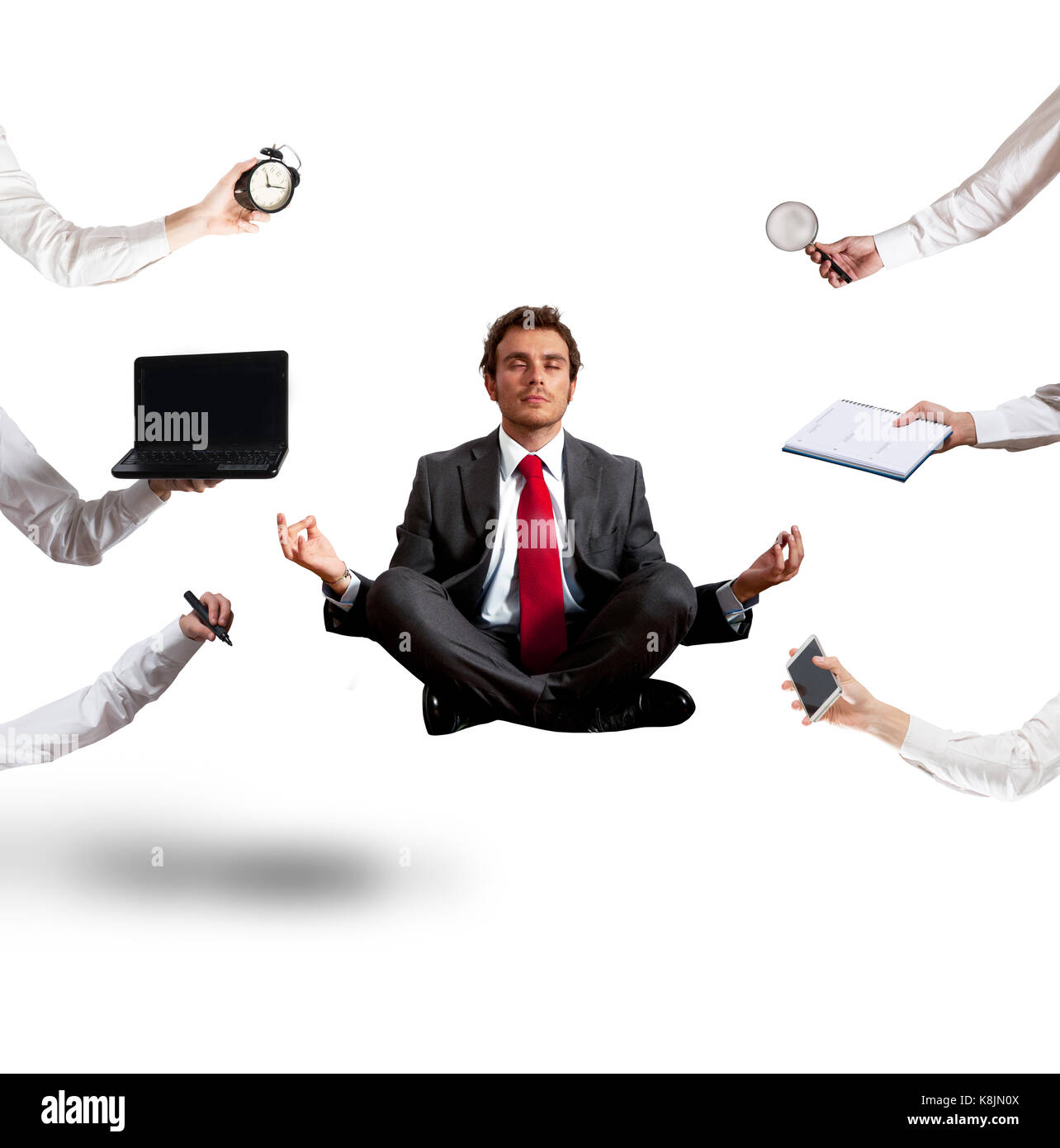 Relaxed businessman that does yoga during the work Stock Photo - Alamy