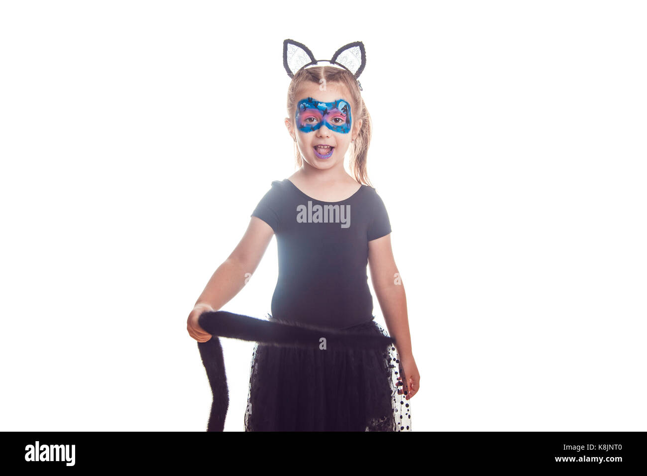 Girl in a cat costume isolated on white. Halloween Stock Photo - Alamy