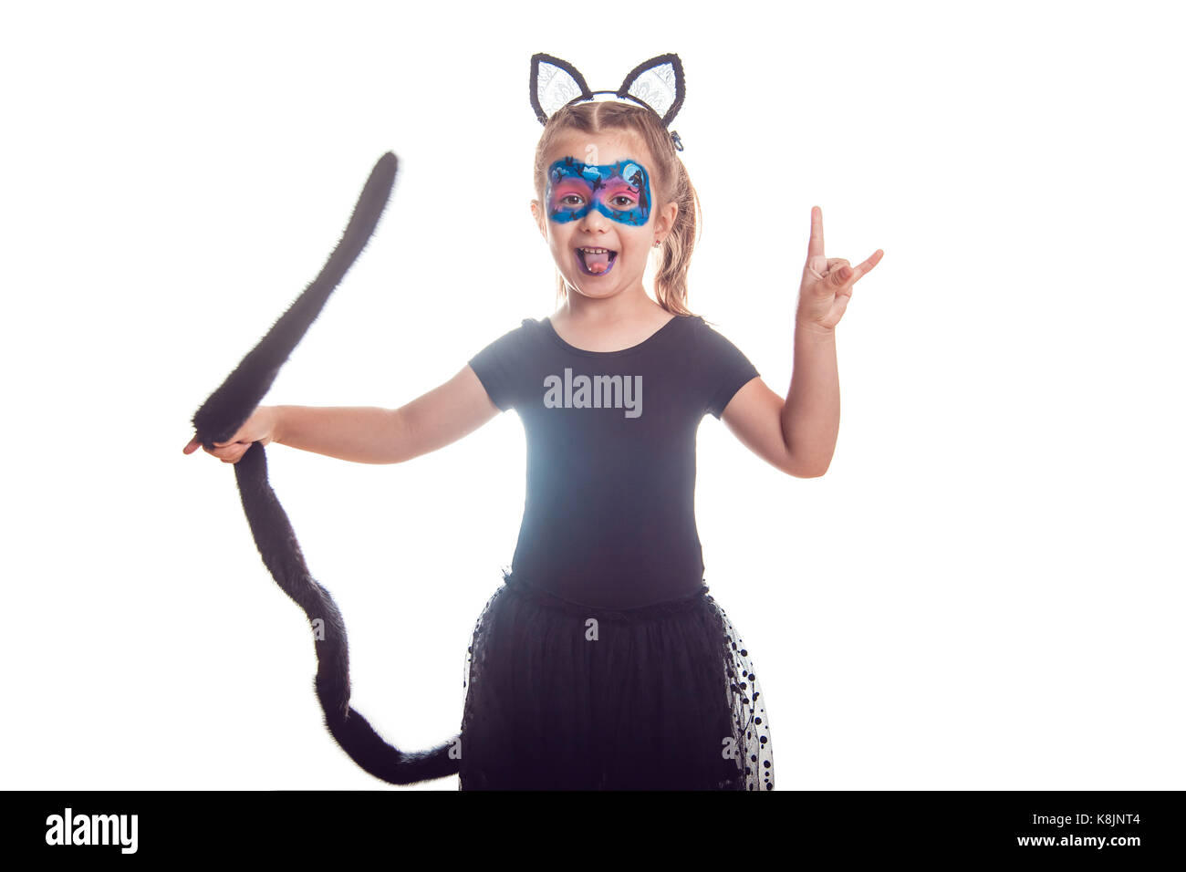 Girl in a cat costume isolated on white. Halloween Stock Photo - Alamy