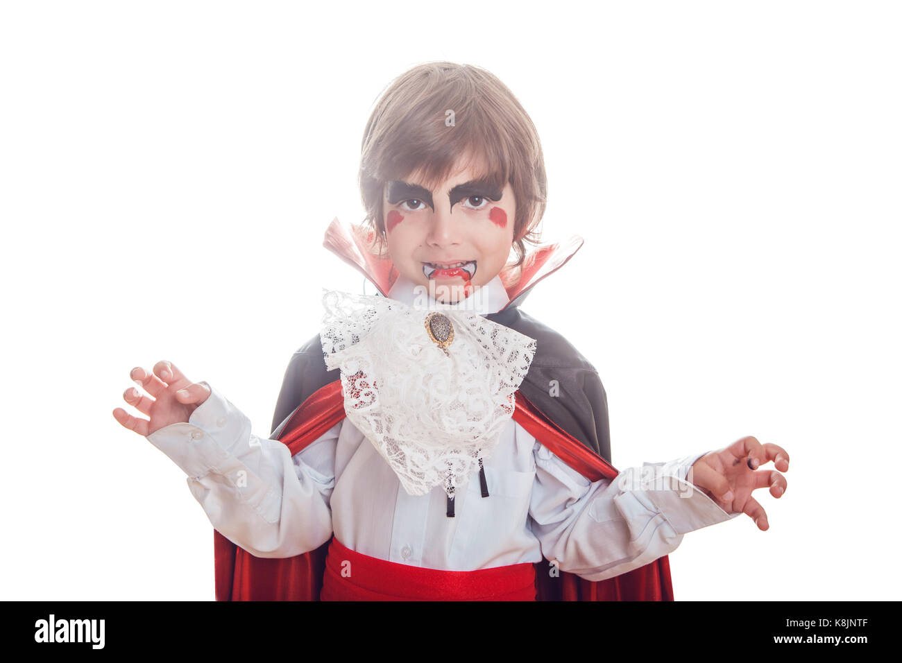Boy in scary Hallowe'en costumes isolated on white. Dracula. Stock Photo