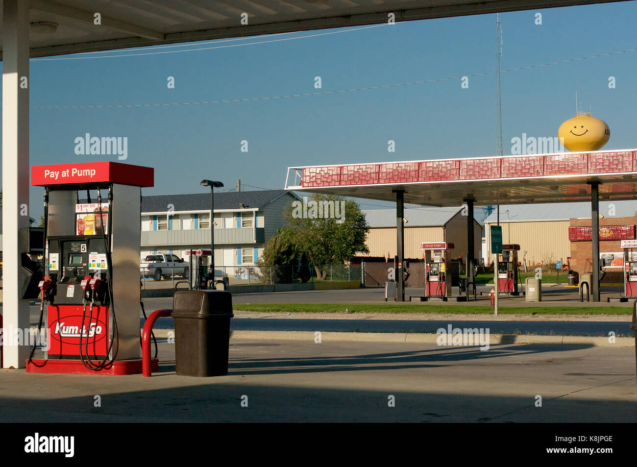 Gas station and the smiley face water tower in Adair, Iowa, USA Stock