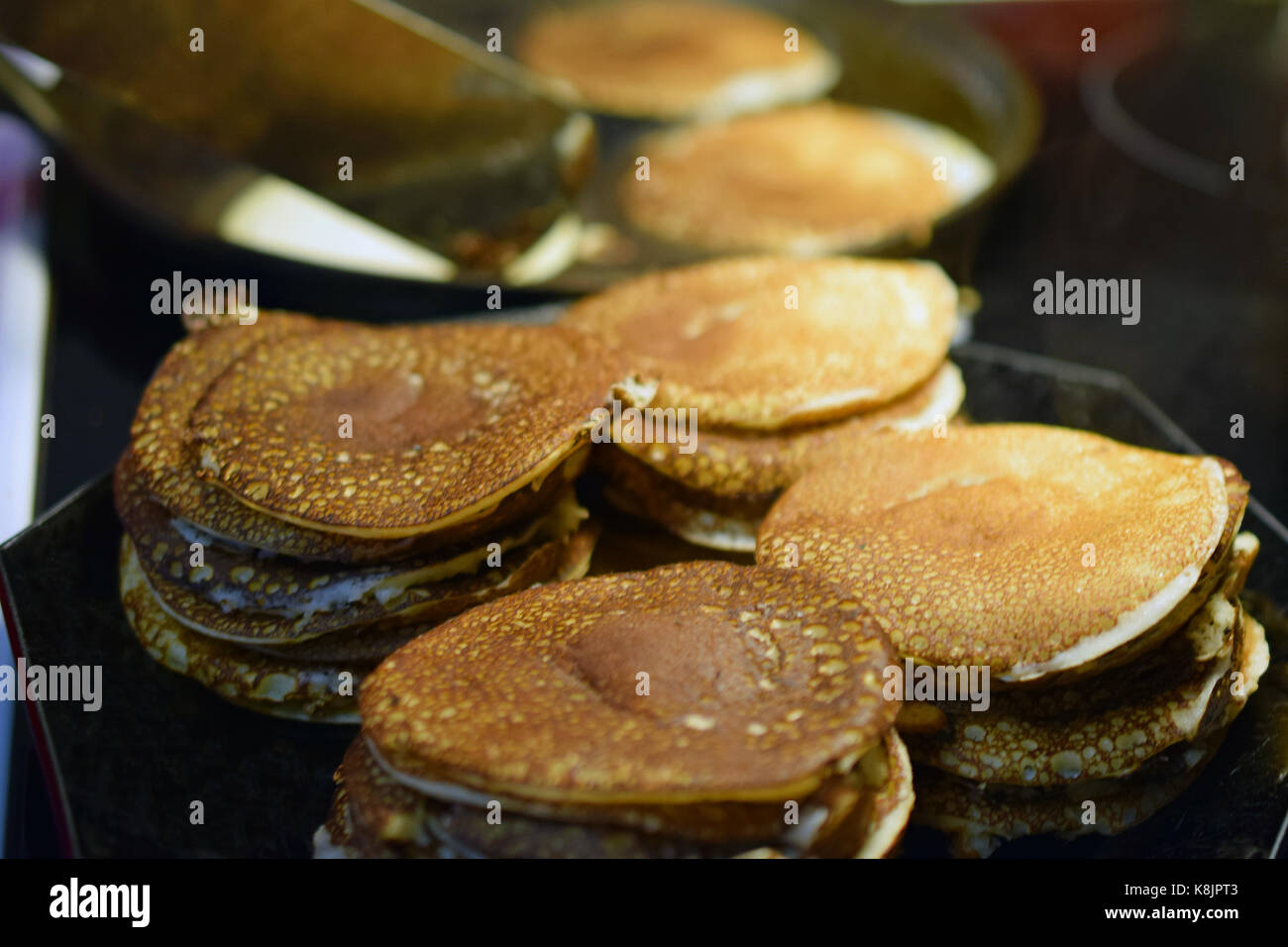 Making pancakes close up. Selective focus. Stock Photo