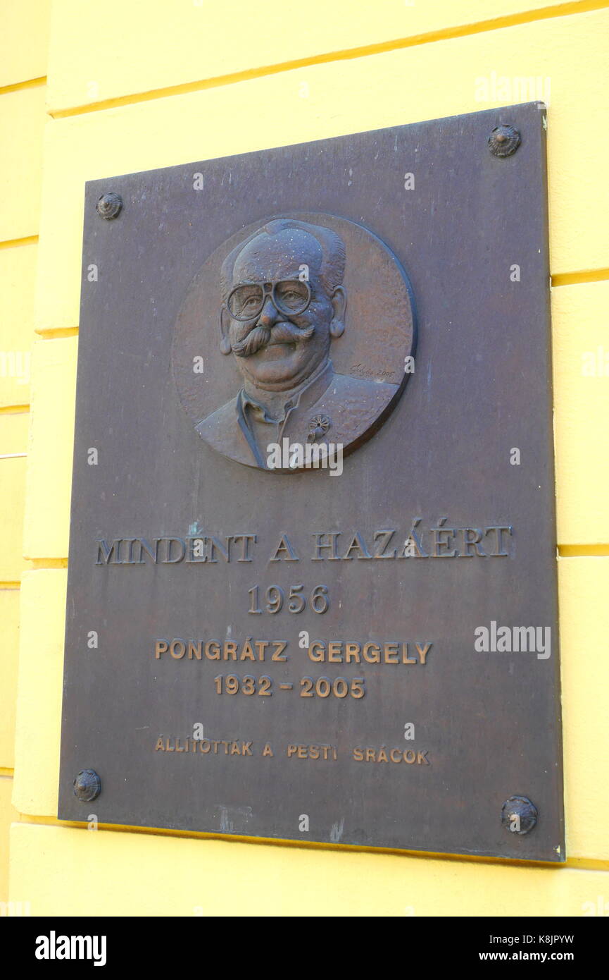 Memorial plaque to Gergely Pongratz, one of the leaders of the 1956 Hungarian Revolution, on the wall of the Corvin Cinema, Budapest, Hungary Stock Photo