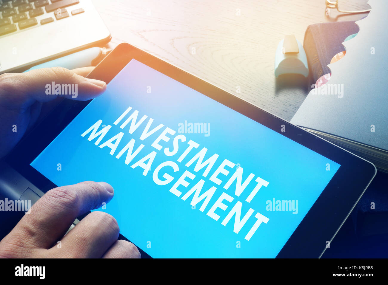Manager holding investment management report. Stock Photo