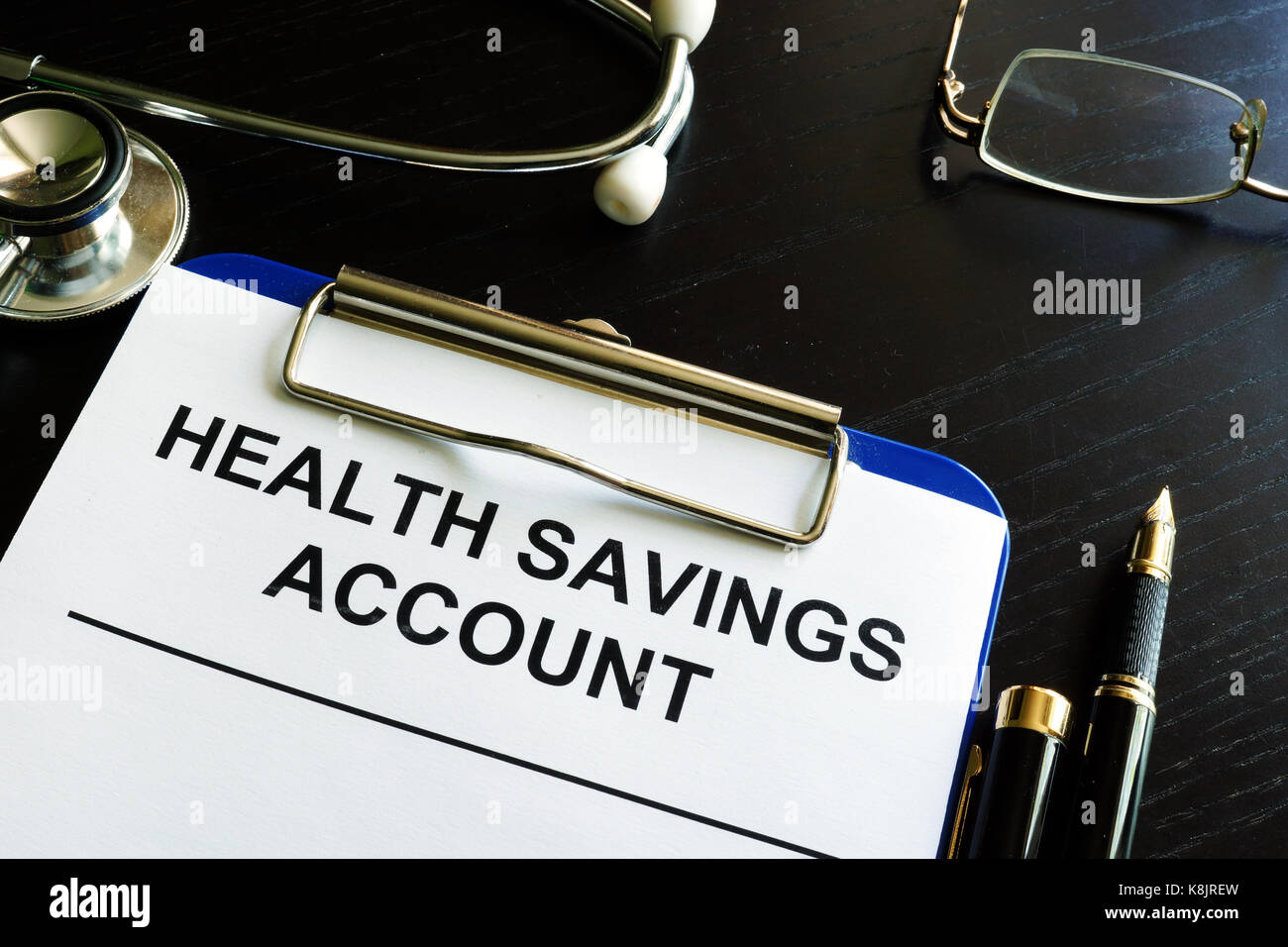 Health savings account HAS form in a clipboard Stock Photo Alamy