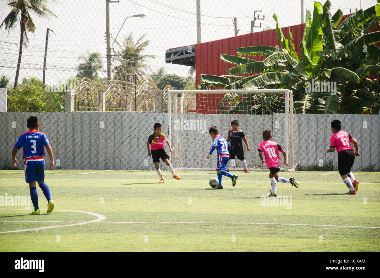Asian boy playing soccer uniform hires stock photography and images