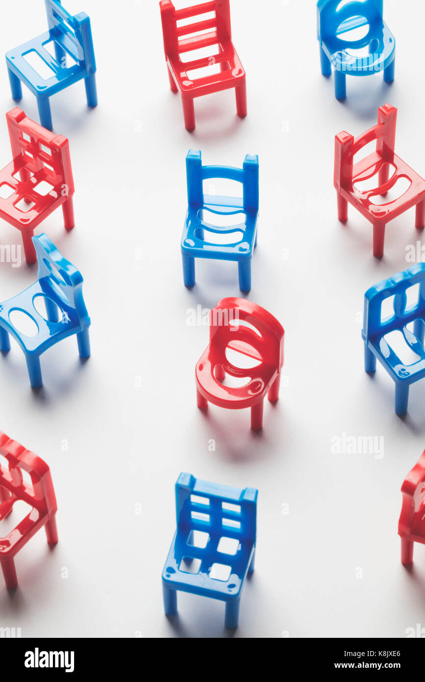 Collection of blue and red chairs Stock Photo Alamy