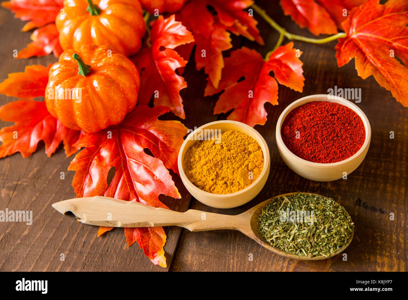 Fall background spices and leaves with pumpkins Stock Photo - Alamy