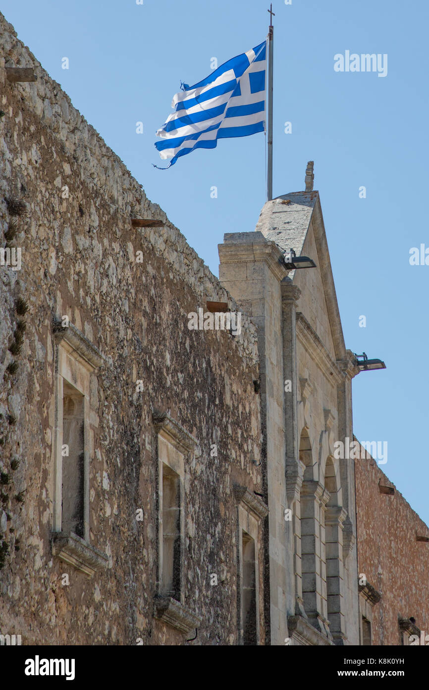 Greek flag flying over the Holy Monastery of Arkadi,Crete Stock Photo