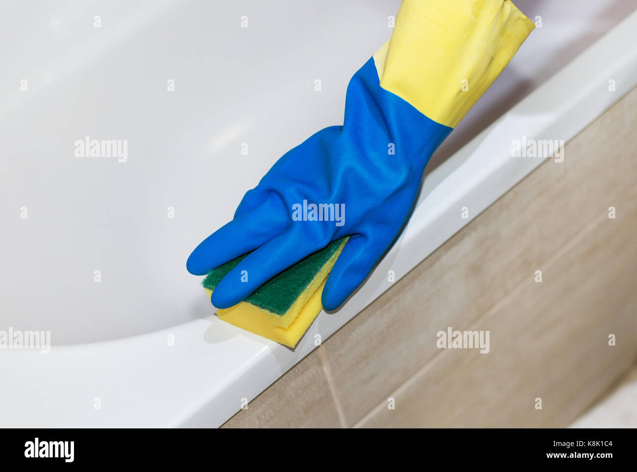 House cleaning. Woman cleaning a bath Stock Photo Alamy