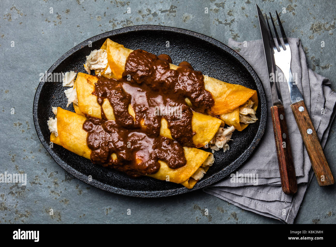 Mexican cuisine. Traditional Mexican chicken enchiladas with spicy