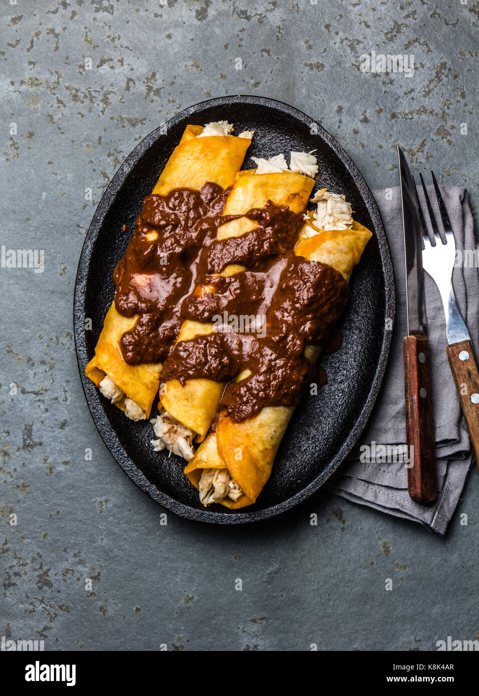 Mexican cuisine. Traditional Mexican chicken enchiladas with spicy