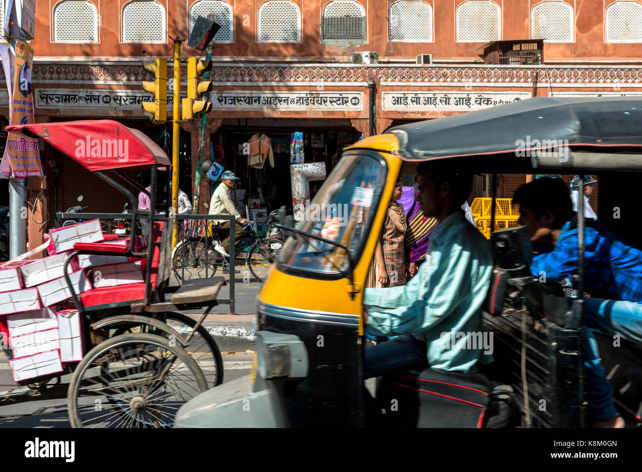 JAIPUR, RAJASTHAN, INDIA - MARCH 11, 2016: Horizontal picture of crowded streets full of rickshaw, motorcycle, people and tuk tuk in Jaipur, known as  Stock Photo