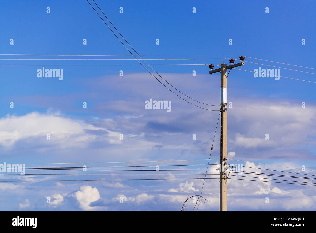High voltage power pole with Blue Sky, electrical Stock Photo - Alamy