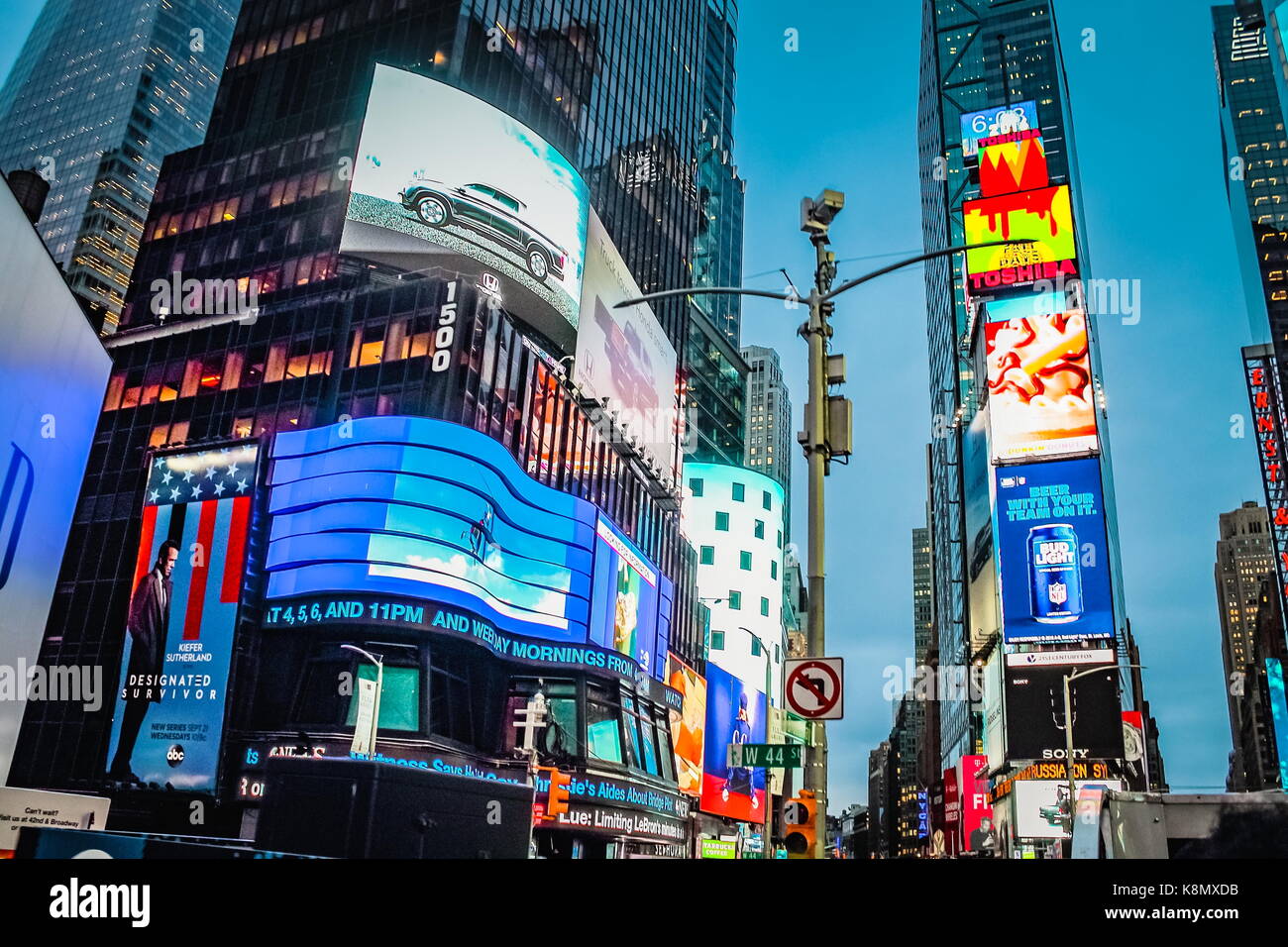New York, USA - September 2016: Times Square advertising billboards in bright lights at West 44th Street, Manhattan. Stock Photo
