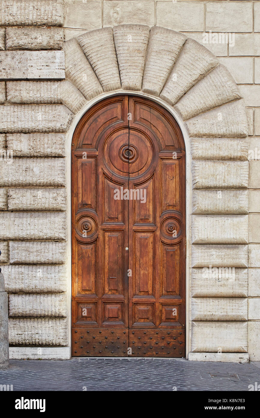 Old brown wooden door in Rome, Italy Stock Photo - Alamy