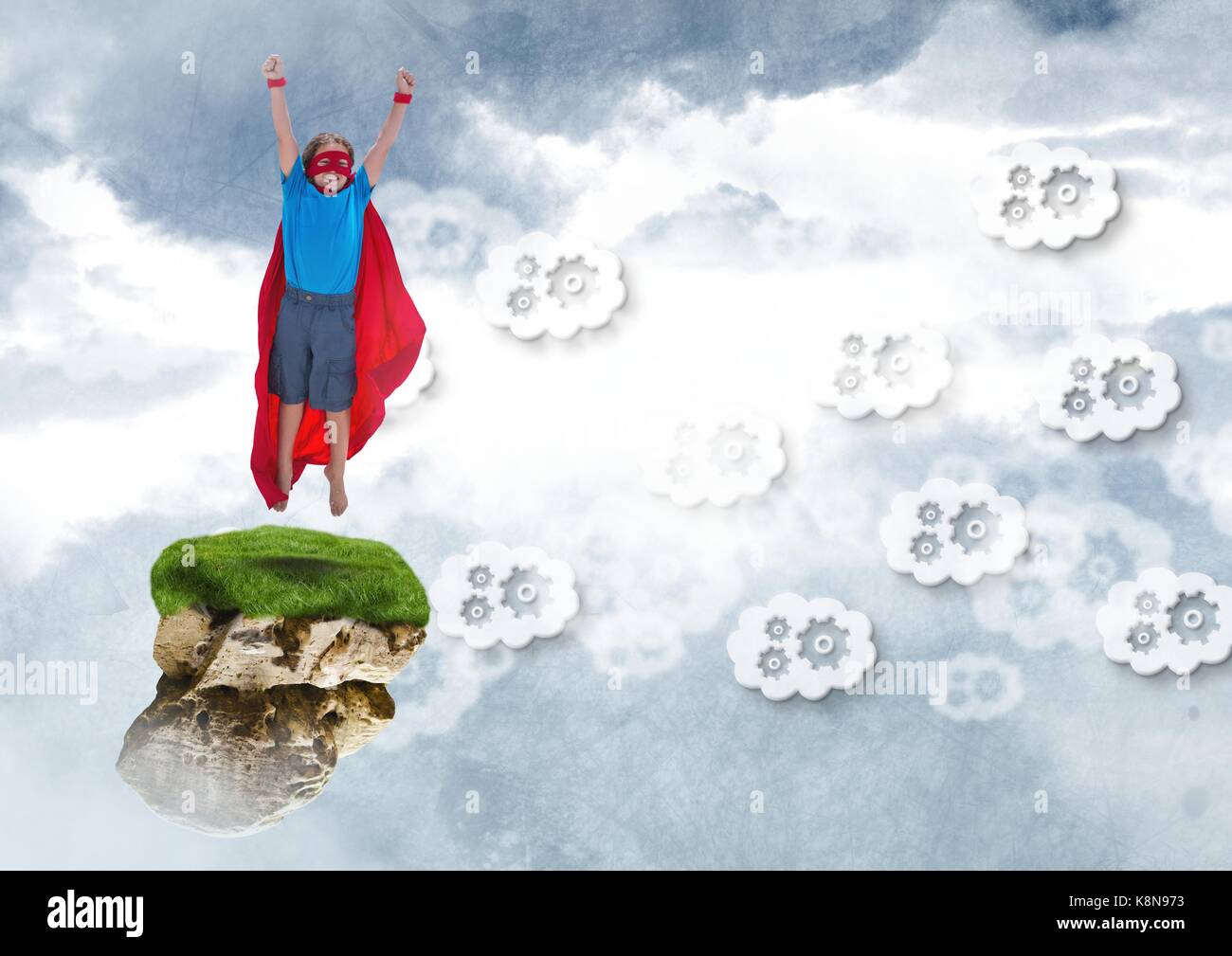 Digital composite of Young child superhero on floating rock platform in ...