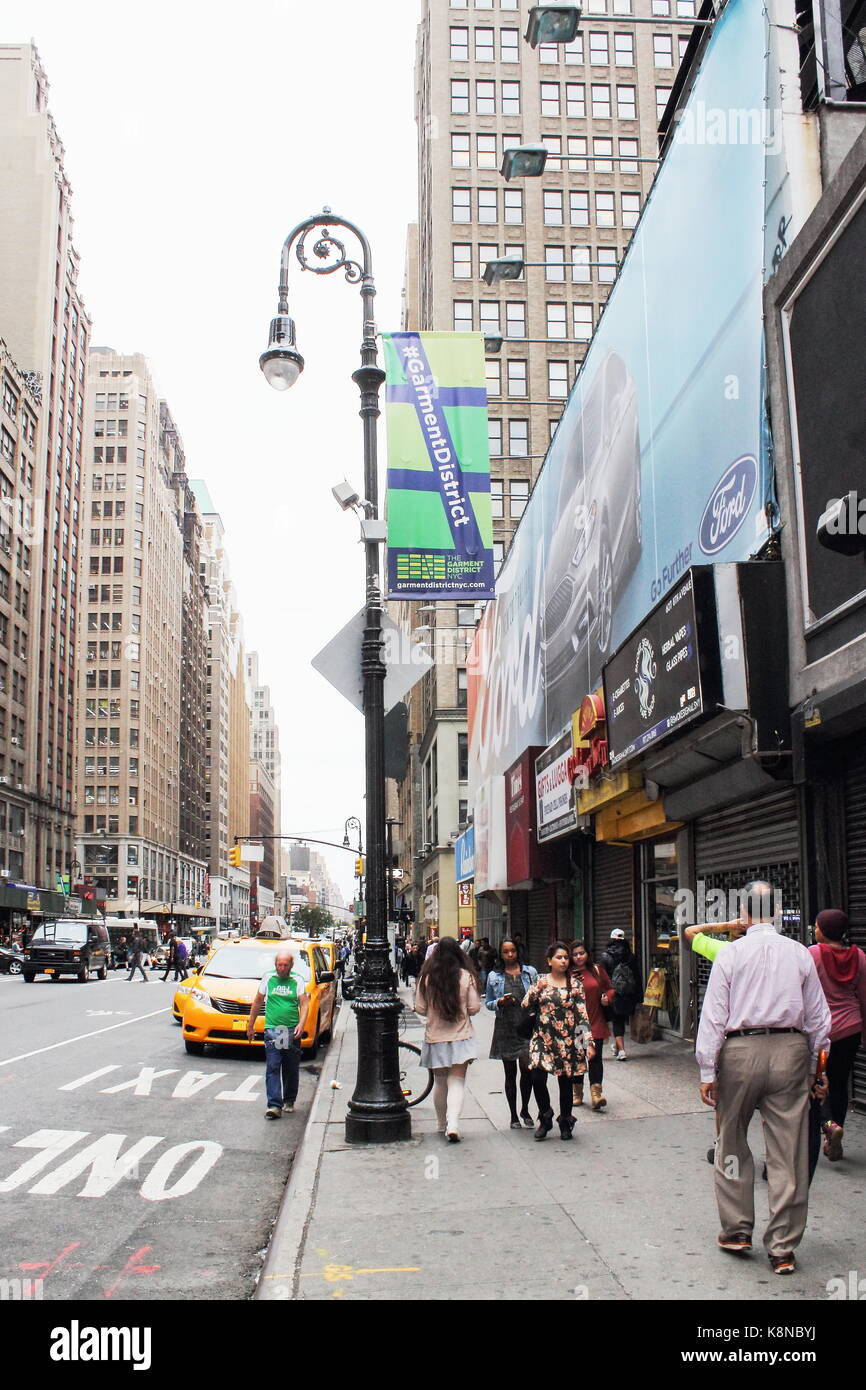 New York, USA - 29 September, 2016: Traffic and Pedestrians on 8th Avenue in Manhattan. Stock Photo
