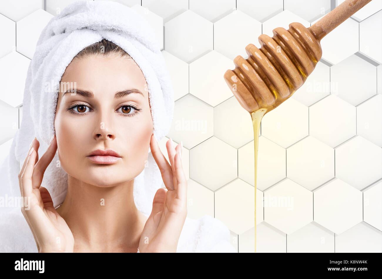 Young woman prepare for honey facial mask. Stock Photo