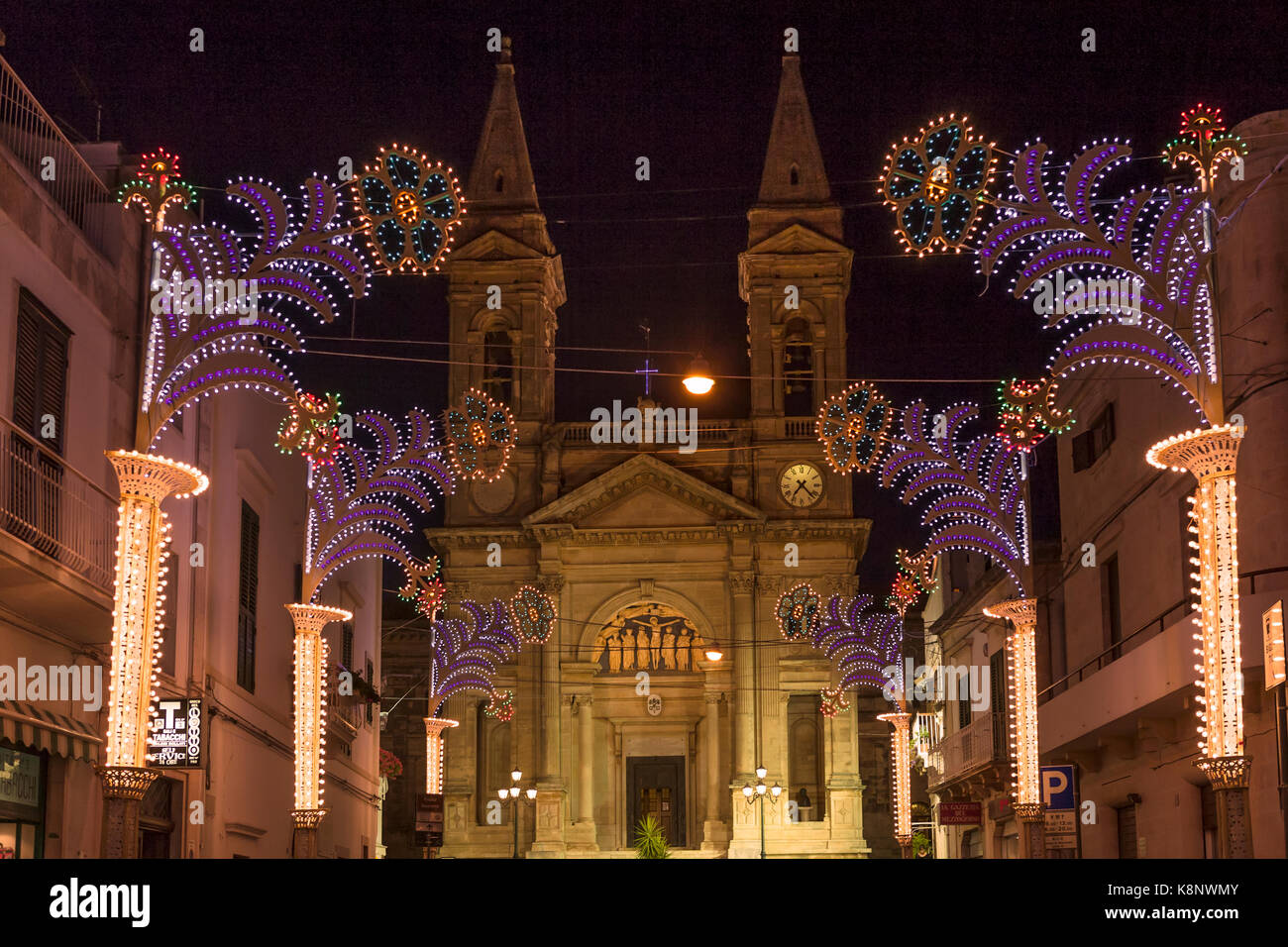 The duomo (cathedral) on Piazza Curri in late evening, Alberobello, Puglia, Italy Stock Photo