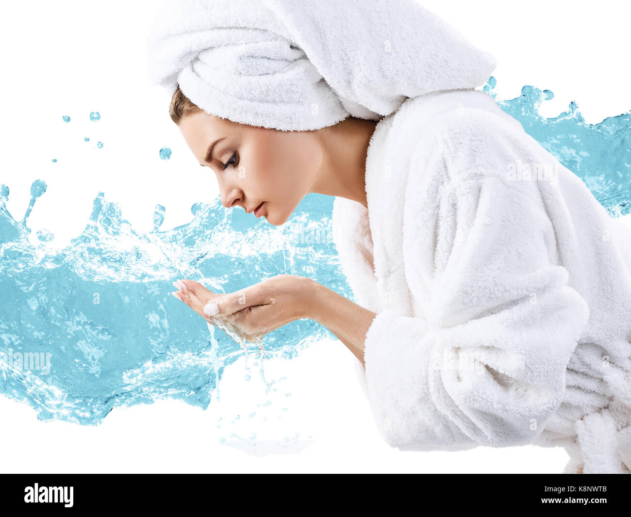 Young woman washing face with clean water Stock Photo Alamy