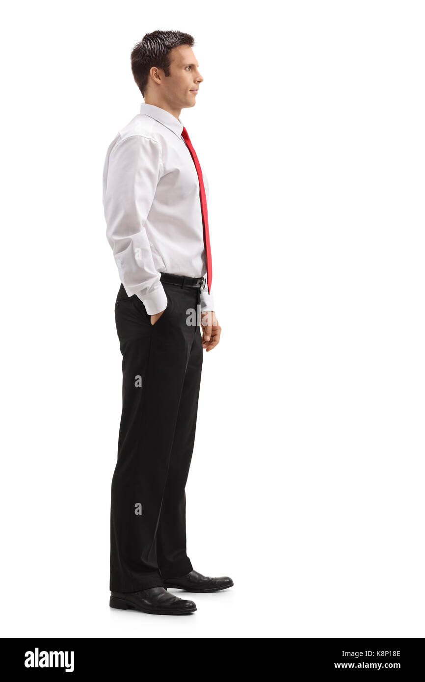 Full length profile shot of a young businessman waiting in line isolated on white background Stock Photo