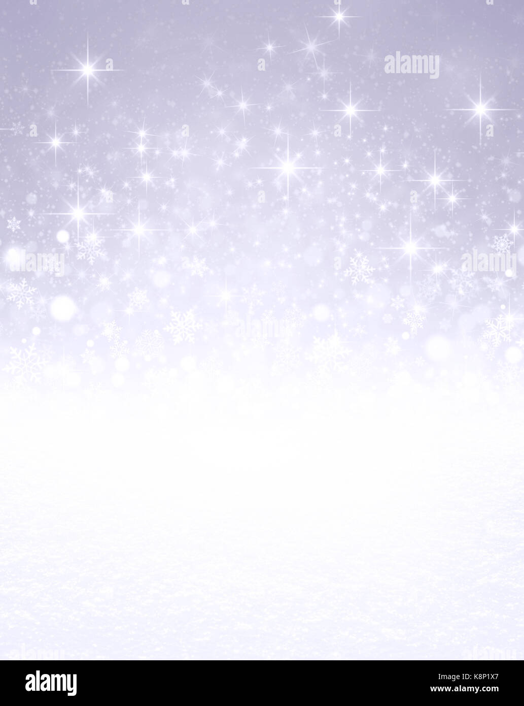 Falling snowflakes, white snow and bright light on a glittering silver colored background Stock Photo