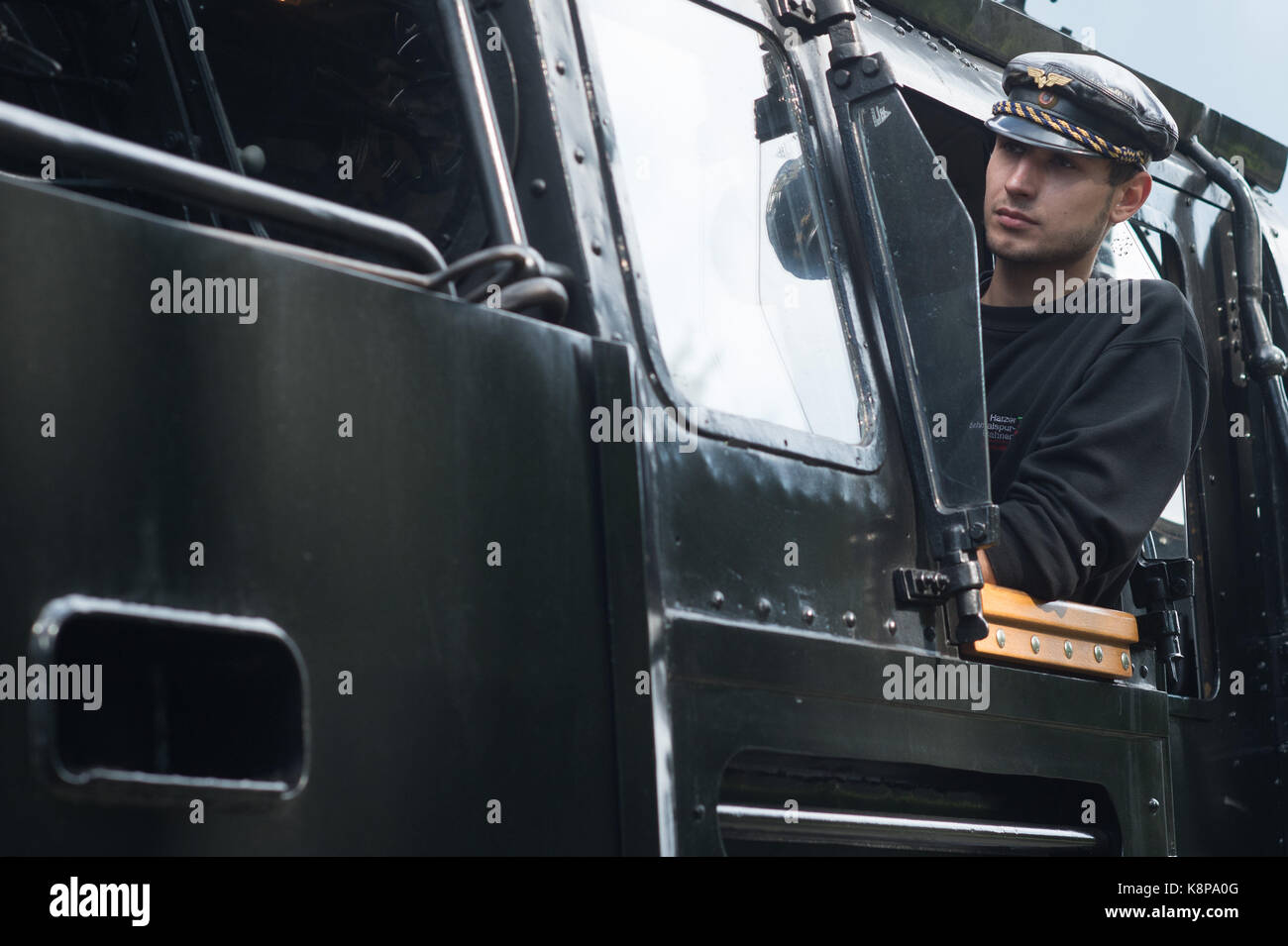 Drei Annen Hohne, Germany. 18th Sep, 2017. Tobias Hinsche of the Harzer Schmalspurbahn (lit. Harz narrow gauge railway) looking out of the window of the newly built locomotive 99 7241 - 5, pulling in to the station at Drei Annen Hohne, Germany, 18 September 2017. Credit: Klaus-Dietmar Gabbert/dpa-Zentralbild/ZB/dpa/Alamy Live News Stock Photo