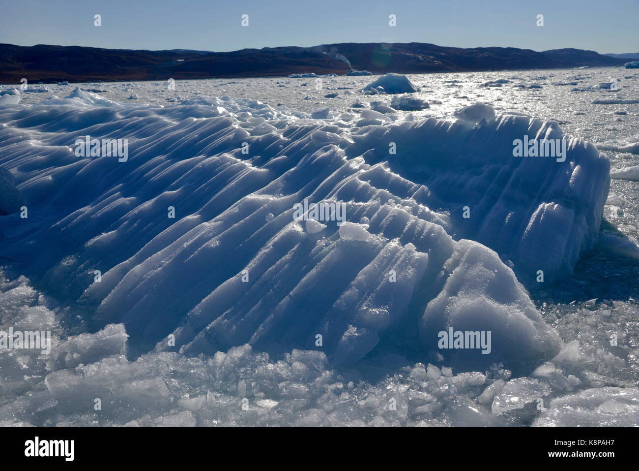 Bizarre ice formations floating in the ice shelf belt. The ice shelf forms a roughly 1 kilometre natural barrier before the precipice of Egip Sermia glacier, one of the most active ones on the west coast of Greenland. It arises from ice inland and spreads out to a width of 4.3 kilometres. Taken 21.08.2017. Photo: Karlheinz Schindler/dpa-Zentralbild/ZB | usage worldwide Stock Photo