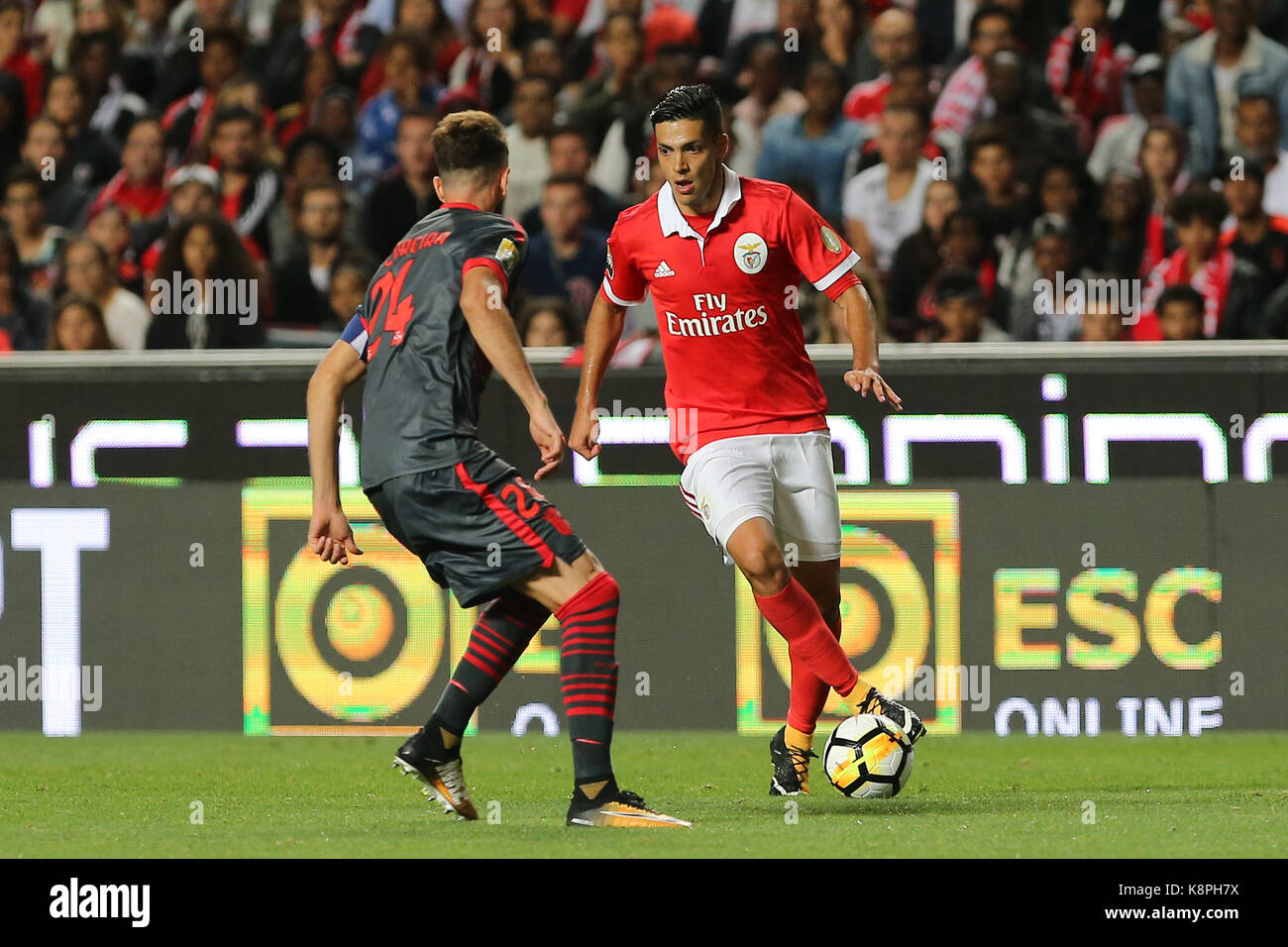 Lisbon, Portugal. 20th Sep, 2017. Benfica's forward Raul Jimenez from Mexico and Braga's defender Ricardo Ferreira from Portugal during the Portuguese Cup 2017/18 match between SL Benfica v SC Braga, at Luz Stadium in Lisbon on September 20, 2017. Credit: Bruno Barros/Alamy Live News Stock Photo