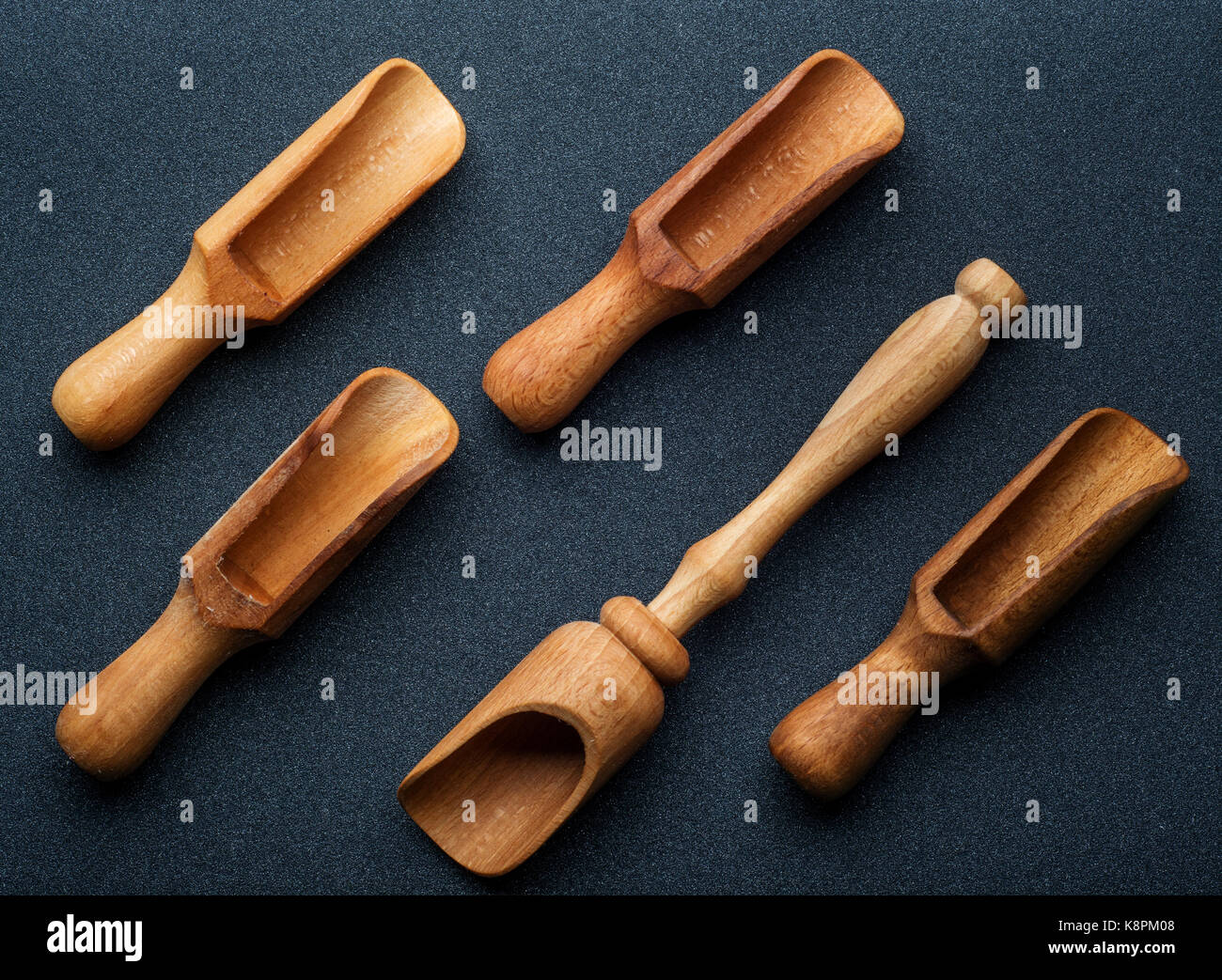 Set of Wooden spoon on dark wooden background Stock Photo