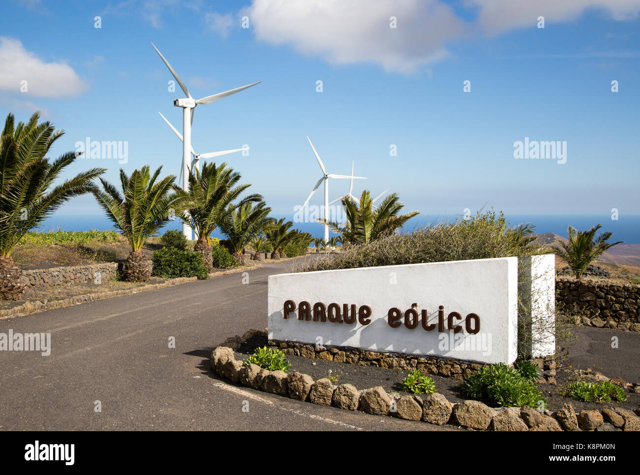 Turbines and sign at Parque Eolico de Lanzarote wind farm, Lanzarote, Canary Islands, Spain Stock Photo