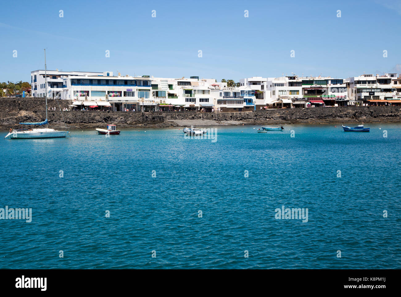 Buildings around harbour at Playa Blanca, Lanzarote, Canary Islands, Spain Stock Photo