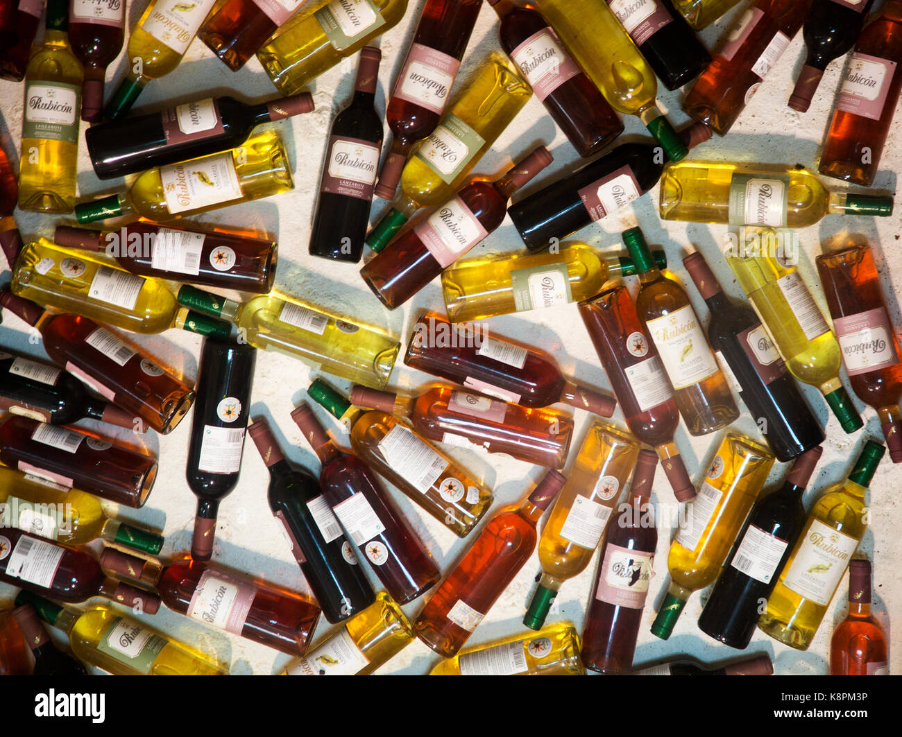 Bottles of wine forming a display in Bodegas Rubicón, La Geria