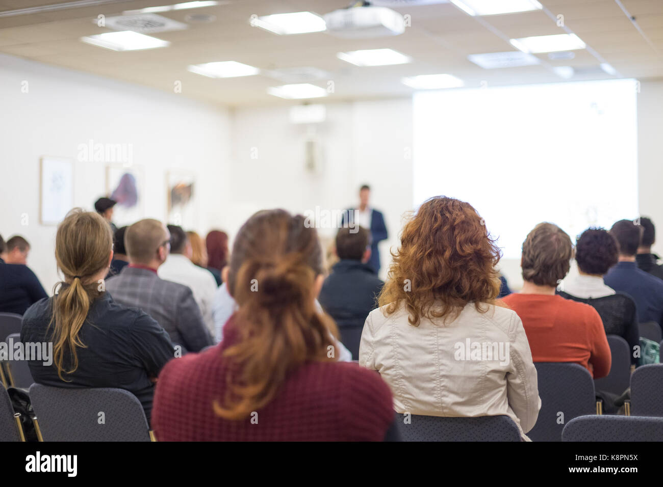 Speaker at Business Conference and Presentation. Stock Photo