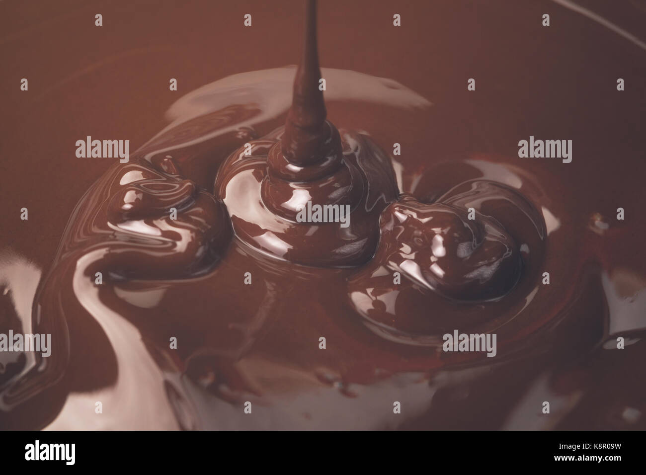 melted dark chocolate flow Stock Photo