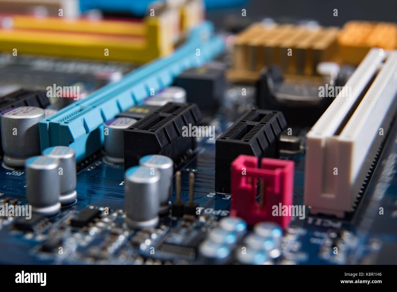 Closeup electronic circuit board background Stock Photo - Alamy