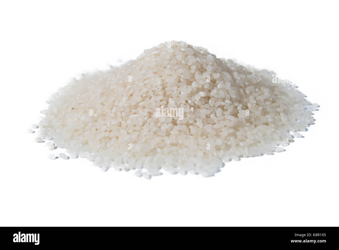 Rice - Cereal Plant, Cereal Plant, Basmati Rice, Food, Seed. White rice background,uncooked raw cereals, macro closeup Stock Photo
