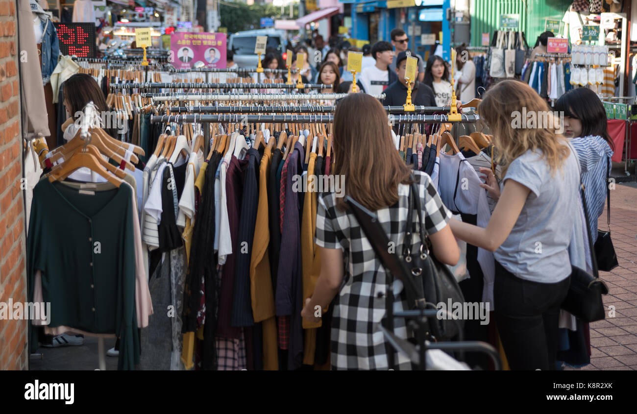 People who pick clothes at a clothing store in Hongdae(Hongik