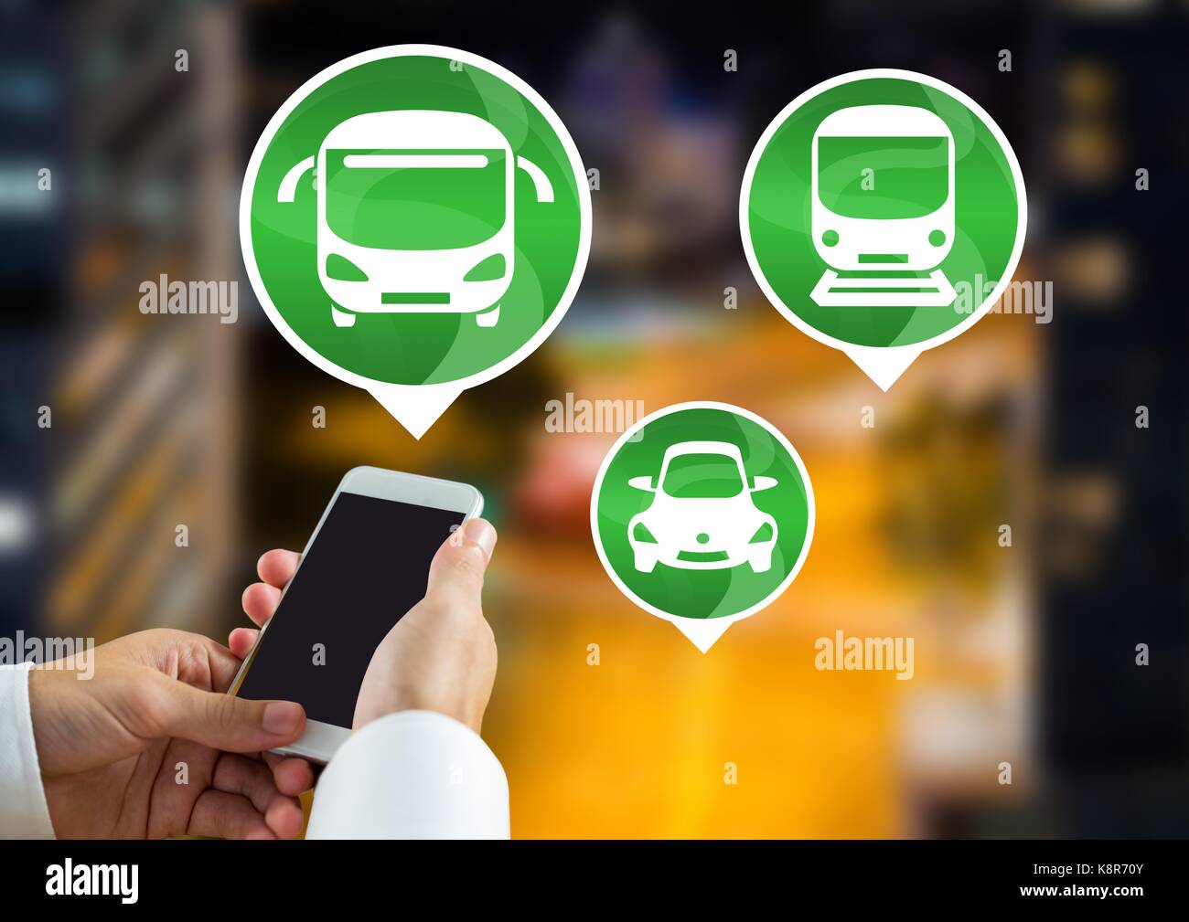 Digital composite of Transport Icons and hand holding phone in city ...
