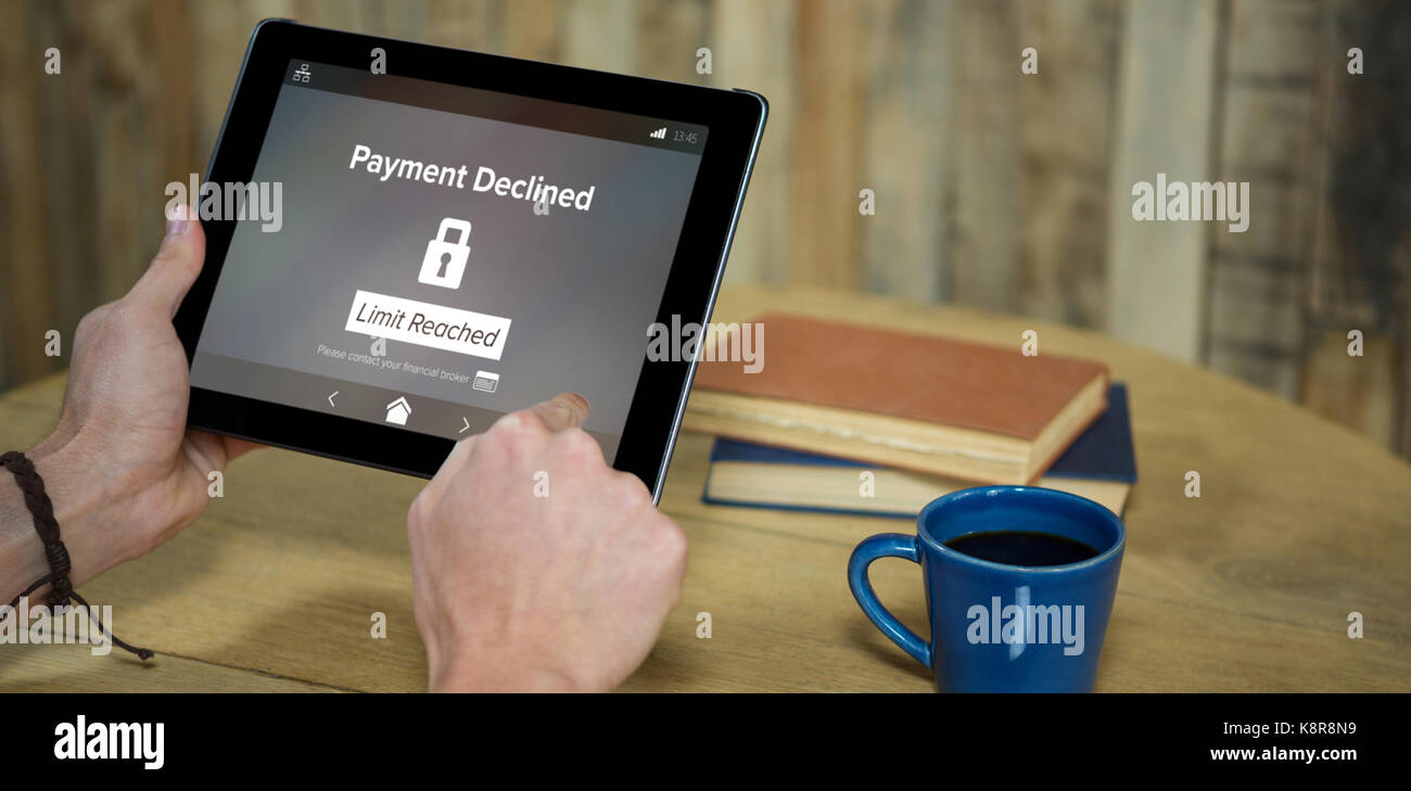 Payment declined and limit reached text on phone screen against man ...