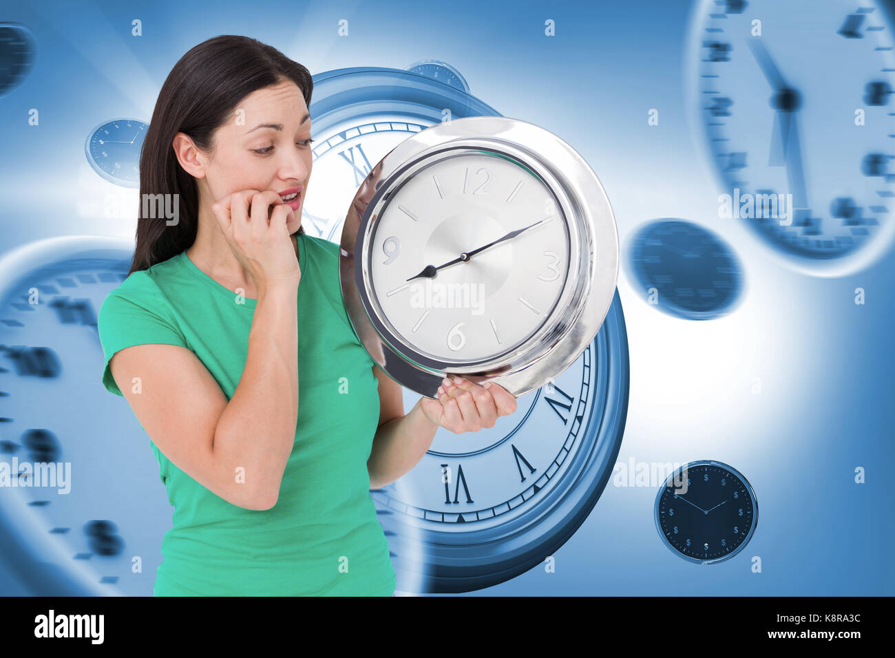 looking at wall clock against graphic image of wall clocks