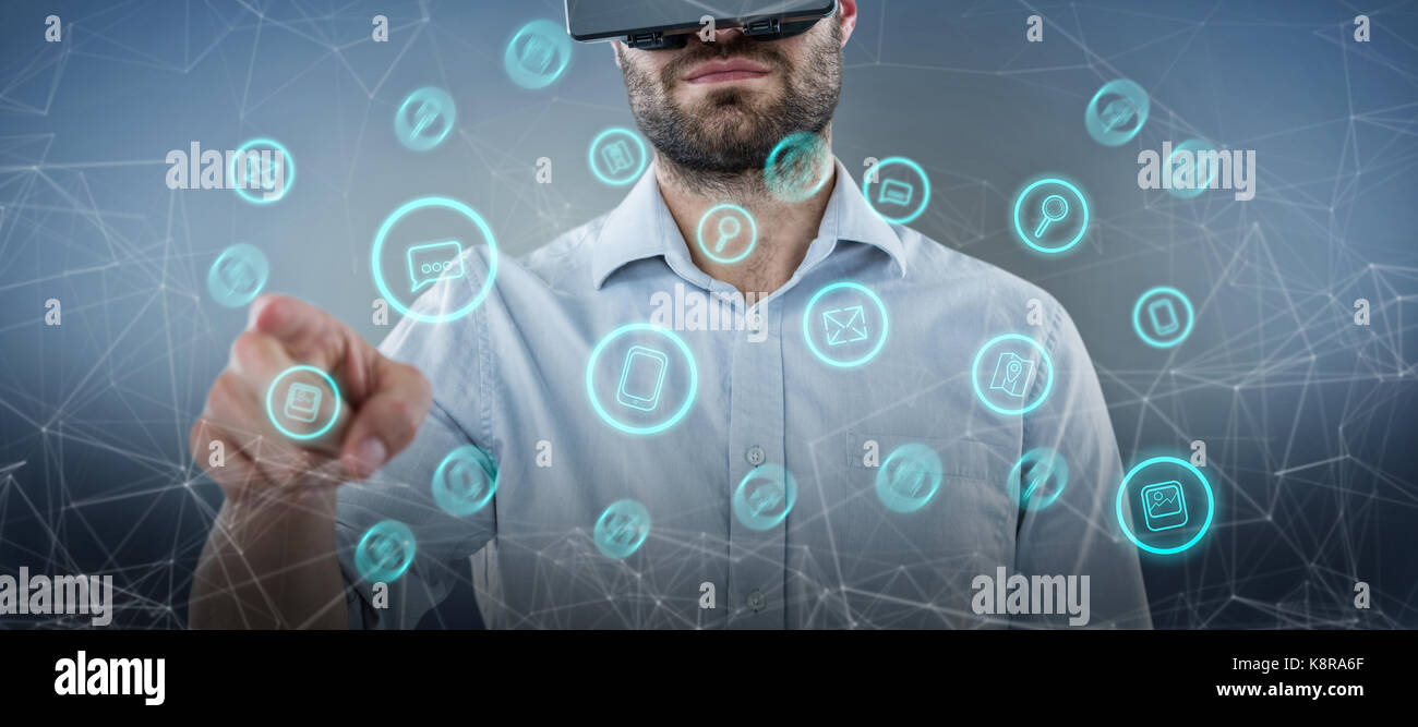 Man pointing while using black oculus rift headset against purple ...