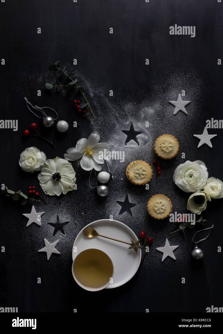 View from above of Christmas tree made of decorations, berries, cinnamon, candles and other festive objects Stock Photo