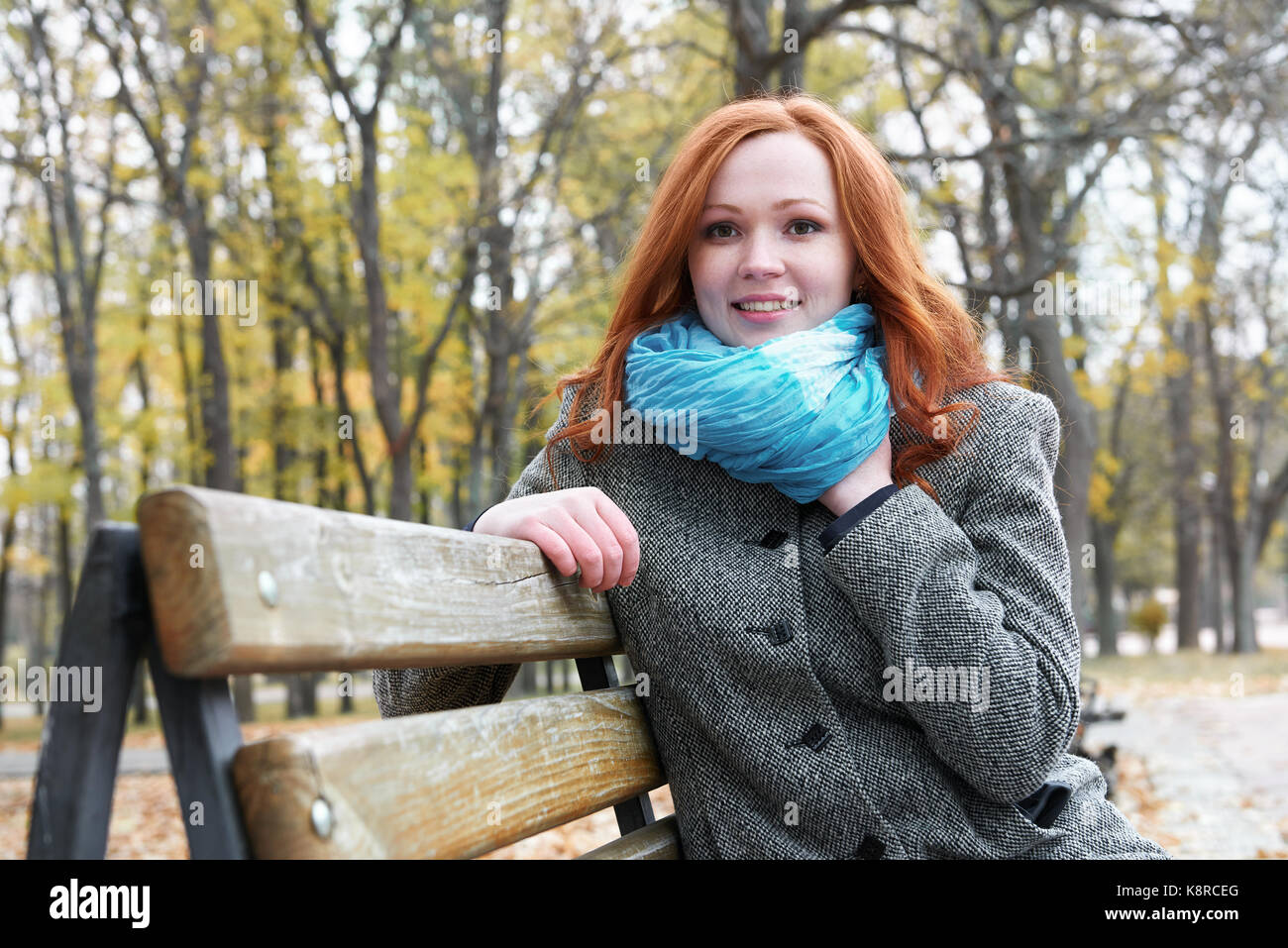 young woman portrait in autumn park, yellow leaves and trees Stock ...