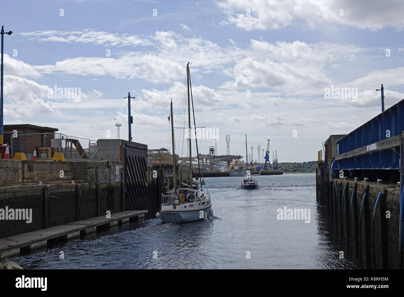 Yachts leaving Ipswich Haven Marina through the open lock gates onto