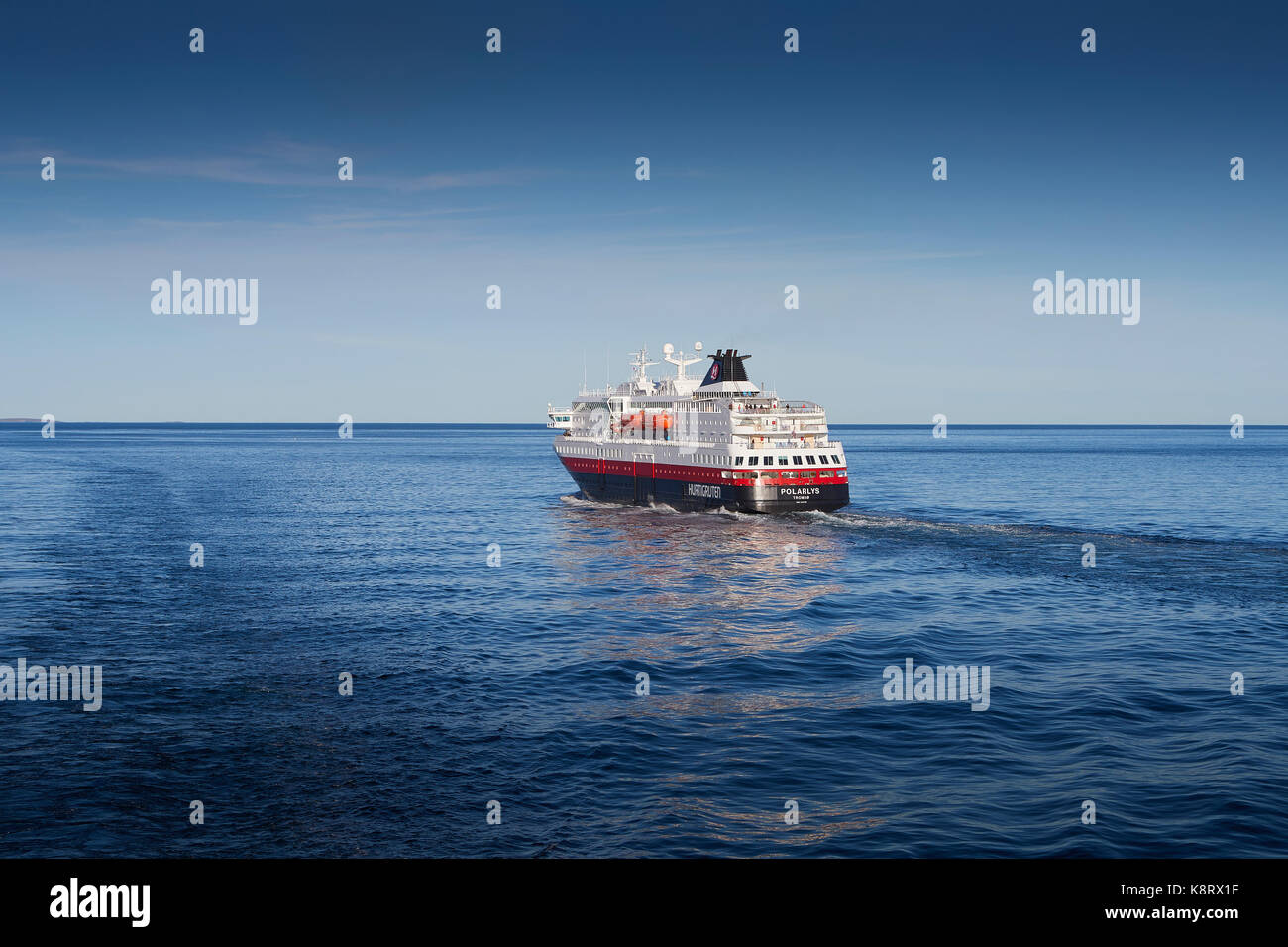 Hurtigruten Ship, MS Polarlys Sailing North, Passing The Norwegian Arctic Island Of Havøya. Stock Photo